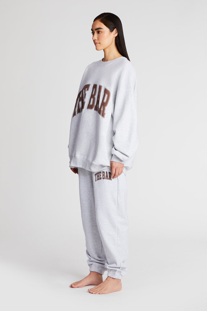 
                  
                    Load image into Gallery viewer, VARSITY SWEATPANTS LT HEATHER GREY/CHOCOLATE
                  
                