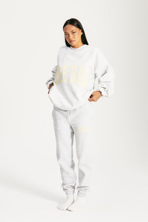 
                  
                    Load image into Gallery viewer, VARSITY SWEATPANTS LT HEATHER GREY
                  
                
