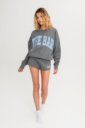 VARSITY TUCKED SWEATSHIRT DARK HEATHER GREY / IRIS – The Bar