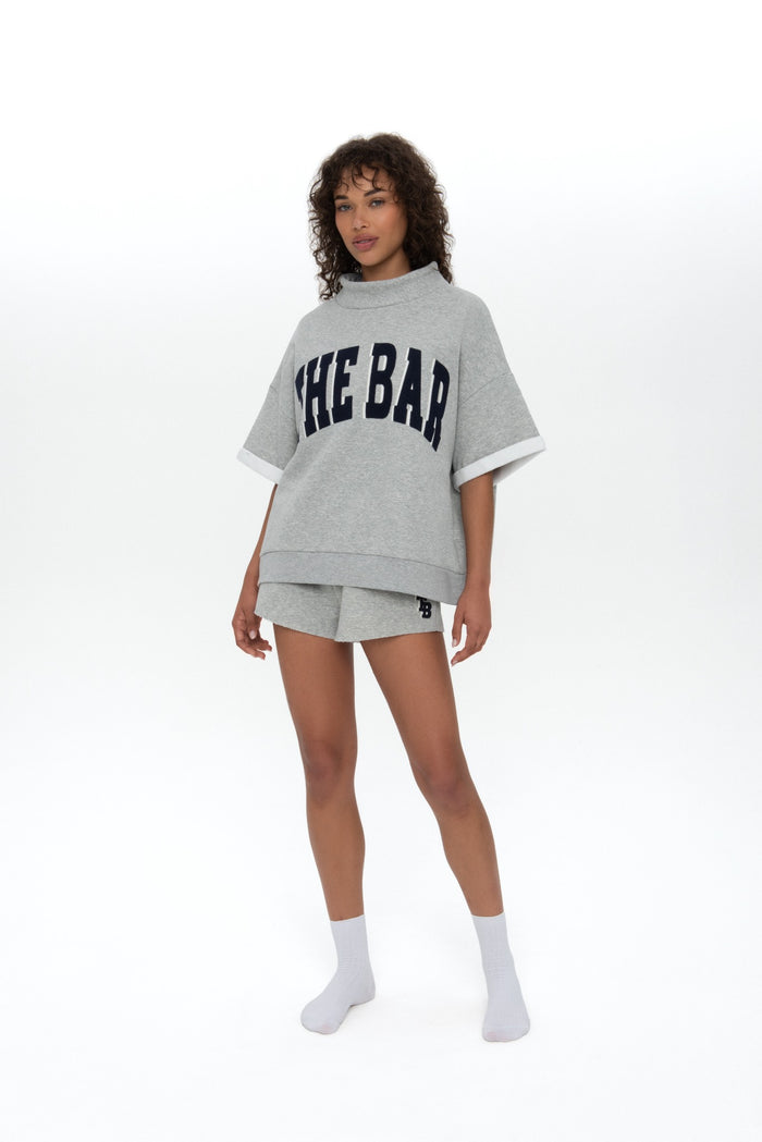 SHORT SLEEVE TWILL APPLIQUÉ HIGHER NECK CEMENT