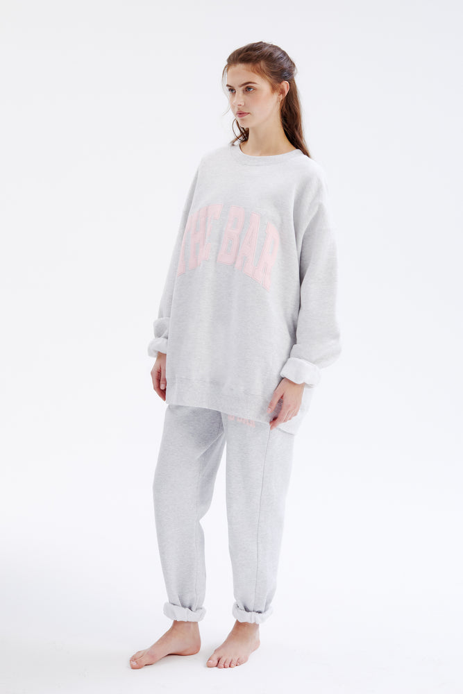 
                  
                    Load image into Gallery viewer, VARSITY SWEATSHIRT LT HEATHER GREY / BLUSH
                  
                